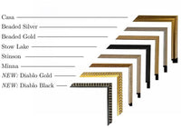 a collection of framed picture frames in various styles and colors, including silver, gold, black, and black and gold.