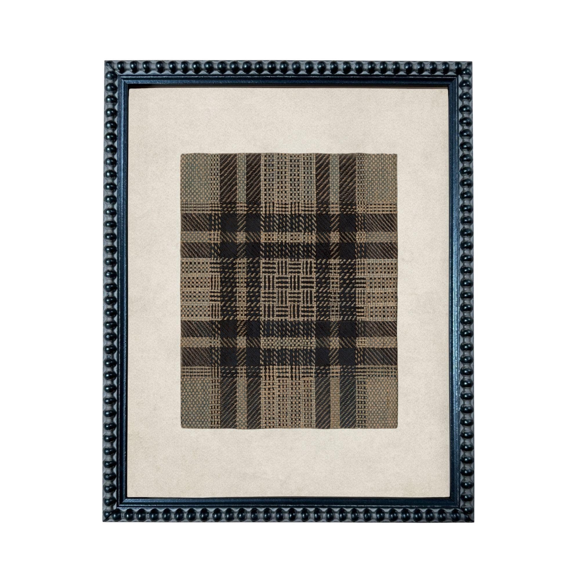 a framed piece of artwork with a plaid pattern on a beige background.
