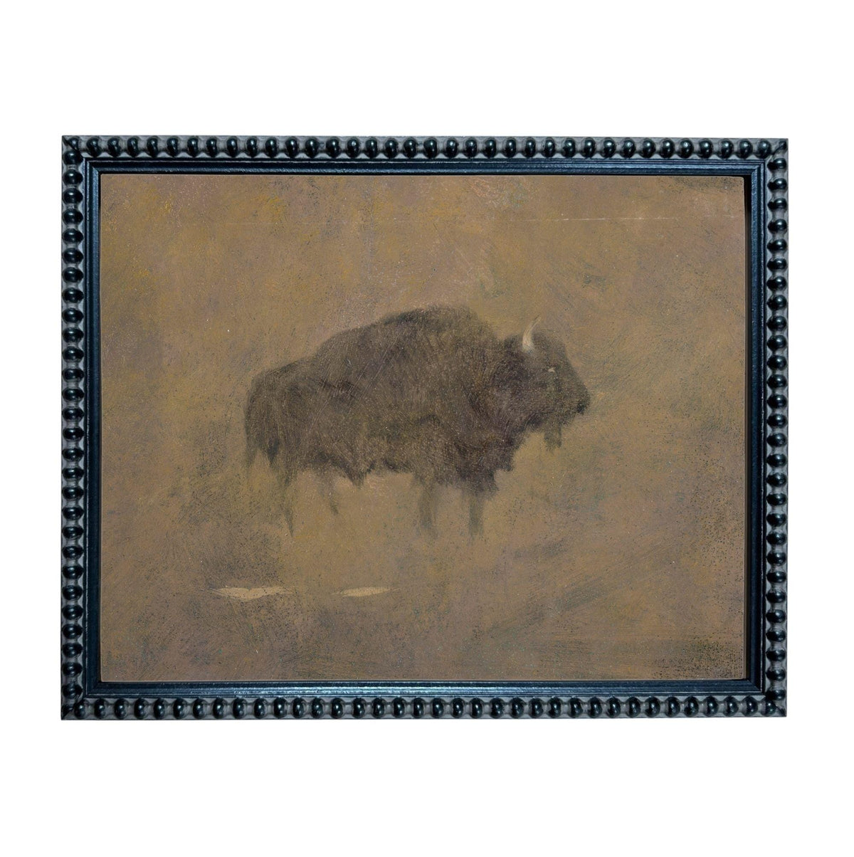 a large, dark-colored animal, possibly a bison or a buffalo, standing in a field or natural setting.