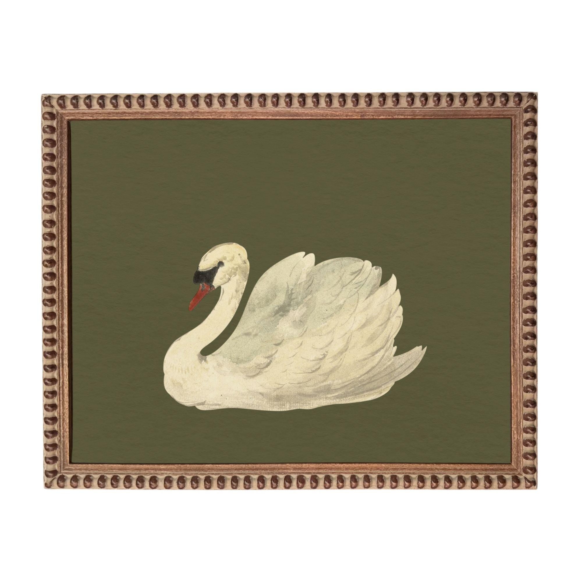 A framed painting of a white swan with a red beak, set against a green background.