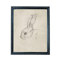 A framed drawing of a rabbit's head in black and white.