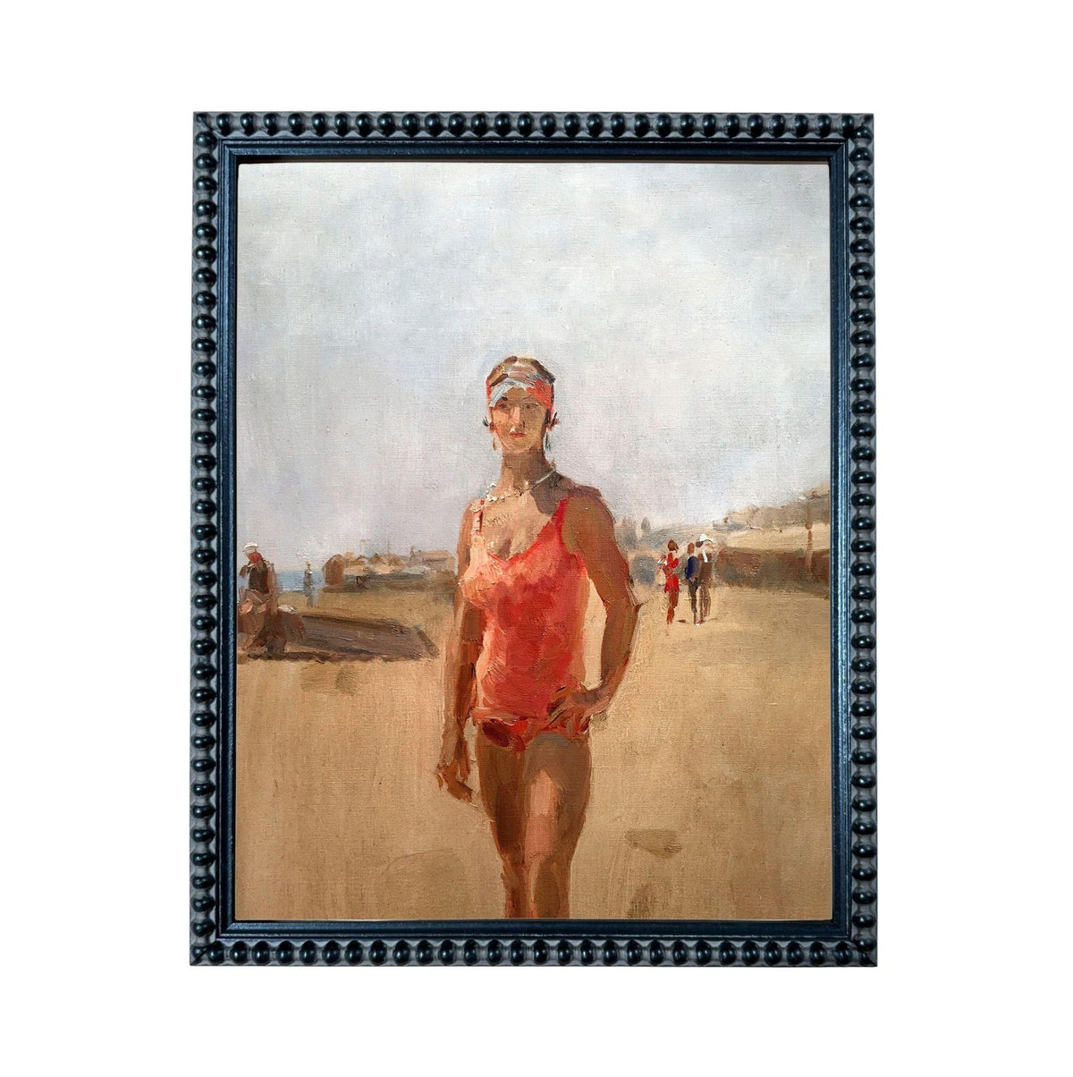 The image is a framed painting depicting a woman in a red swimsuit standing on a beach, with other people visible in the background.