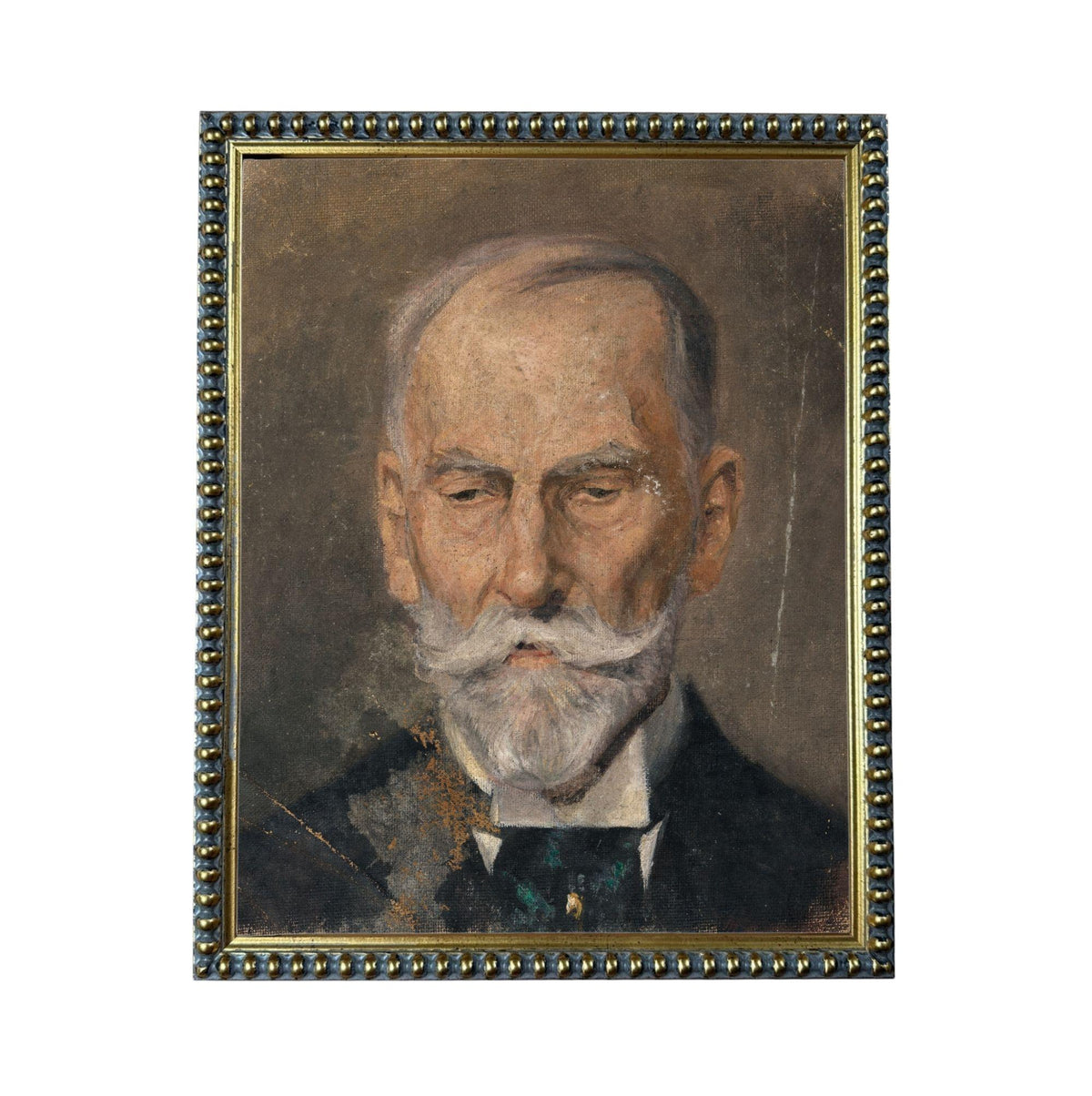 The image is a portrait of an elderly man with a white beard and mustache, wearing a suit and tie.