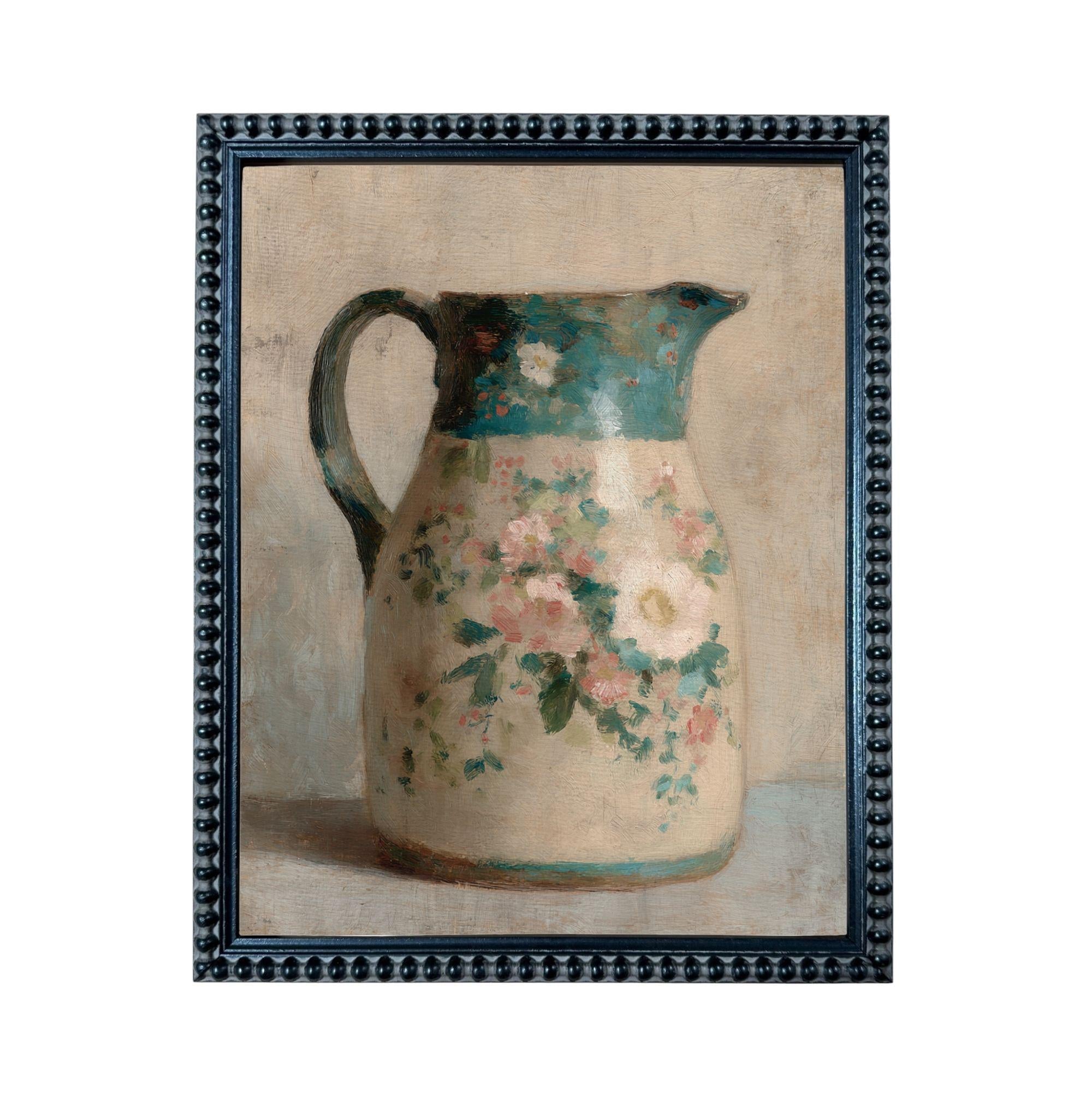 A framed painting depicting a floral-patterned pitcher against a neutral background.