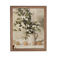 The image is a painting of a vase filled with white flowers and green leaves, placed on a table with three lemons.