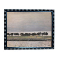 The image is a framed painting depicting a serene landscape with a body of water, trees, and a cloudy sky.