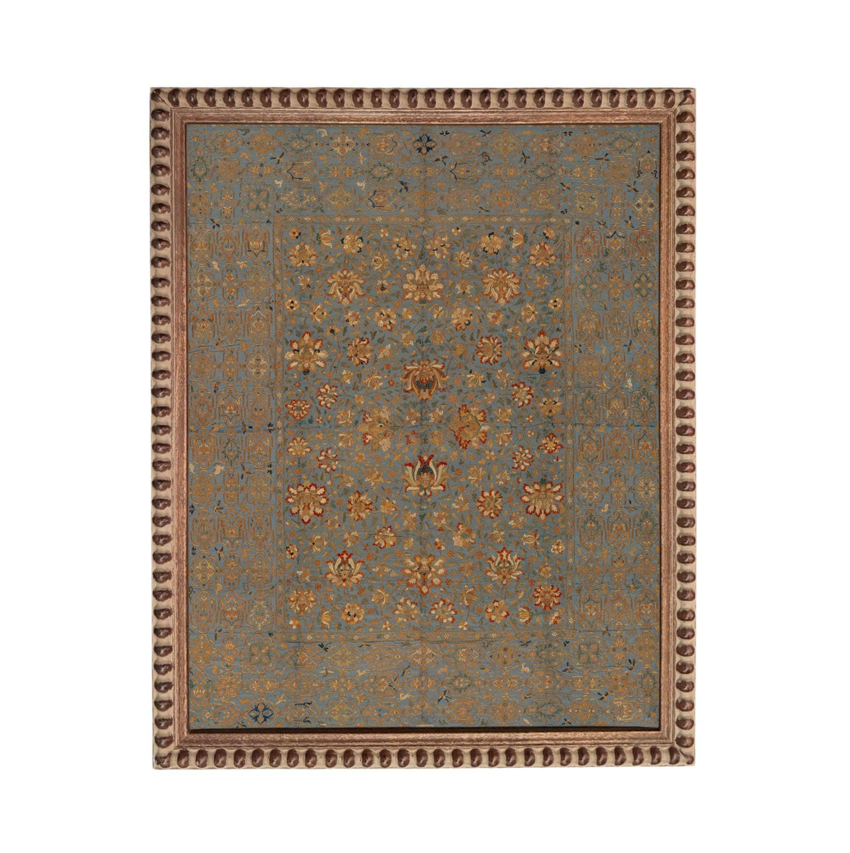 a large, intricately designed rug with a blue and gold color scheme. The rug has a geometric pattern with floral and geometric motifs, creating a visually striking and detailed design.