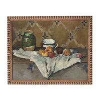 The image is an oil painting depicting a still life arrangement of a green vase, a white cup, and various fruits such as apples and peaches, all placed on a table covered with a white cloth.