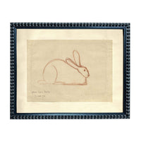 The image is a framed artwork depicting a rabbit, which is a type of rabbit.