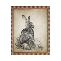 A black and white illustration of a rabbit sitting in tall grass.