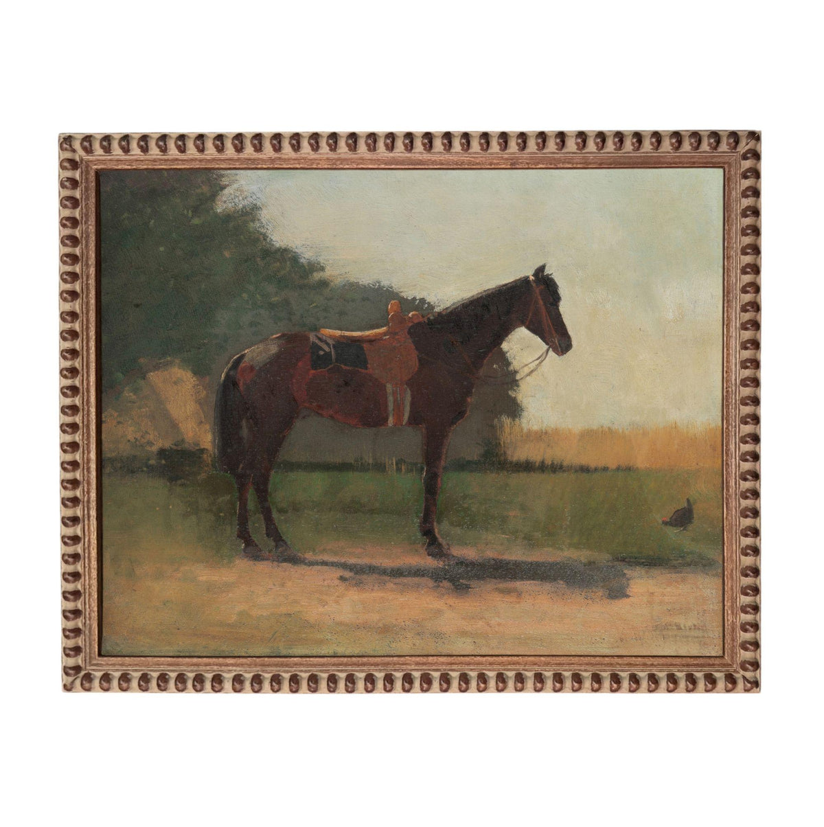 a brown horse standing in a grassy field, with a person sitting on its back.