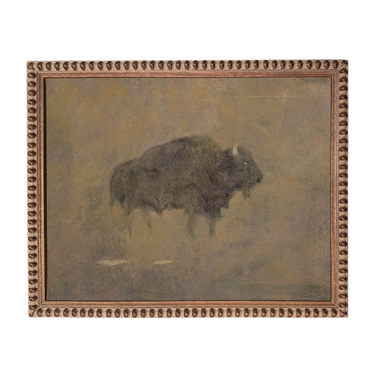a large, dark-colored animal, possibly a bison or a buffalo, standing in a field or natural environment.