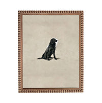 A black dog sitting on a beige background within a brown frame.