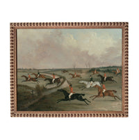 a group of people riding horses in a field, with some horses galloping and others running.