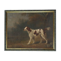 A painting of a white and brown dog standing in a field with trees in the background.