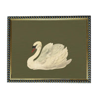 A framed painting of a white swan with a red beak, set against a dark green background.