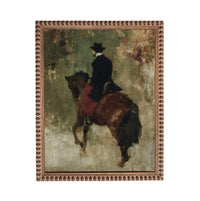 a man riding a horse, with the horse and rider in the center of the frame.