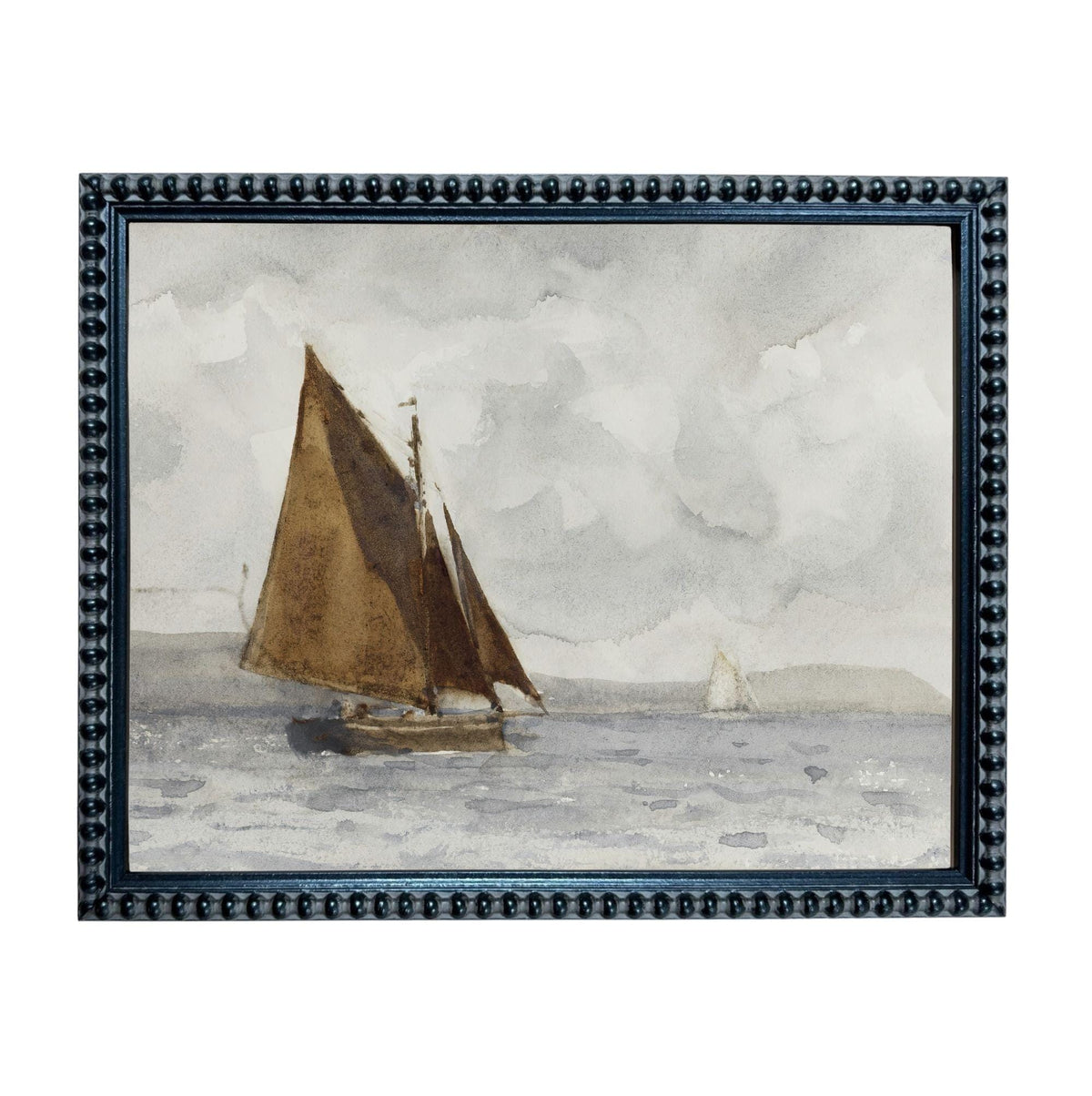 A framed watercolor painting depicting a sailboat on the water with a cloudy sky in the background.