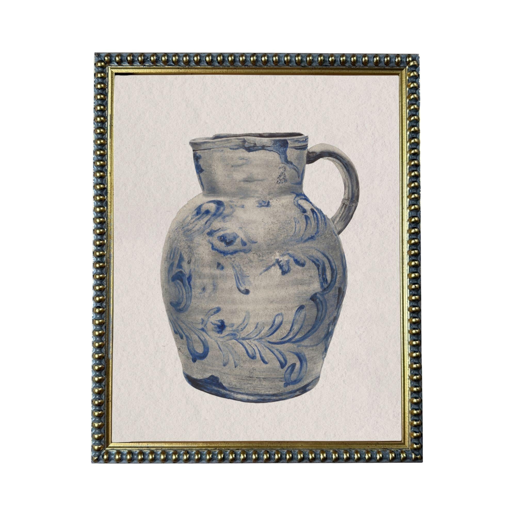 A framed image of a blue and white ceramic pitcher with a floral pattern.