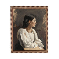 The image is a portrait of a woman in profile, wearing a white blouse.