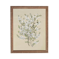 The image is a framed painting depicting a tree with white flowers.